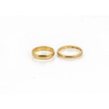 Two early 20th Century 22ct gold wedding bands, both plain, 6g (2)