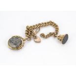 A Victorian and later 9ct gold watch chain, supporting two fob seals, 27g