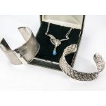 A modern silver marcasite and turquoise pendant necklace, together with a white metal cuff
