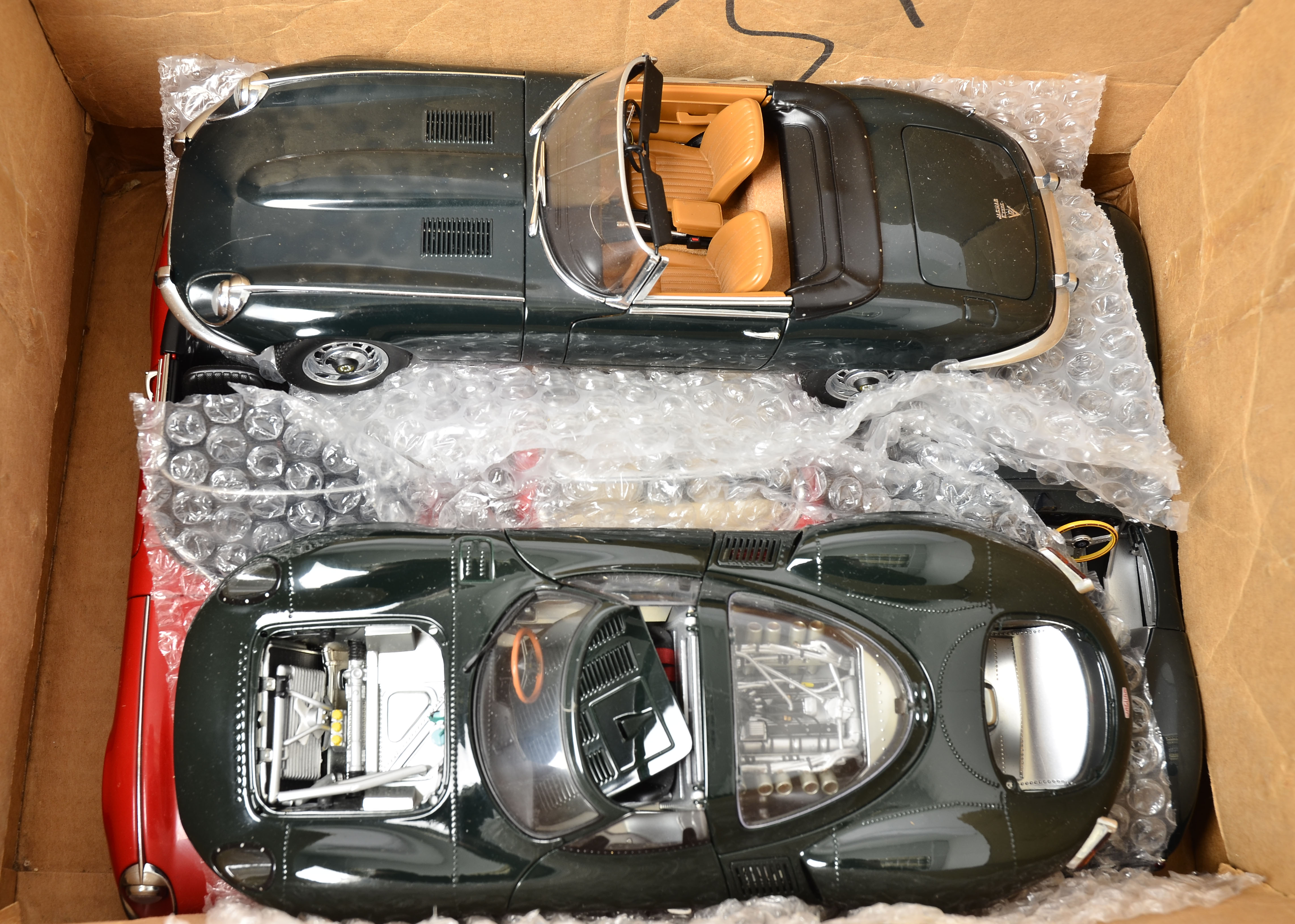 1:18 scale Models, an unboxed collection of private and competition vehicles, including Autoart