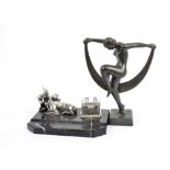 A 20th Century desk stand, in the form of a silver plated mother doe and her faun beside an ink pot,