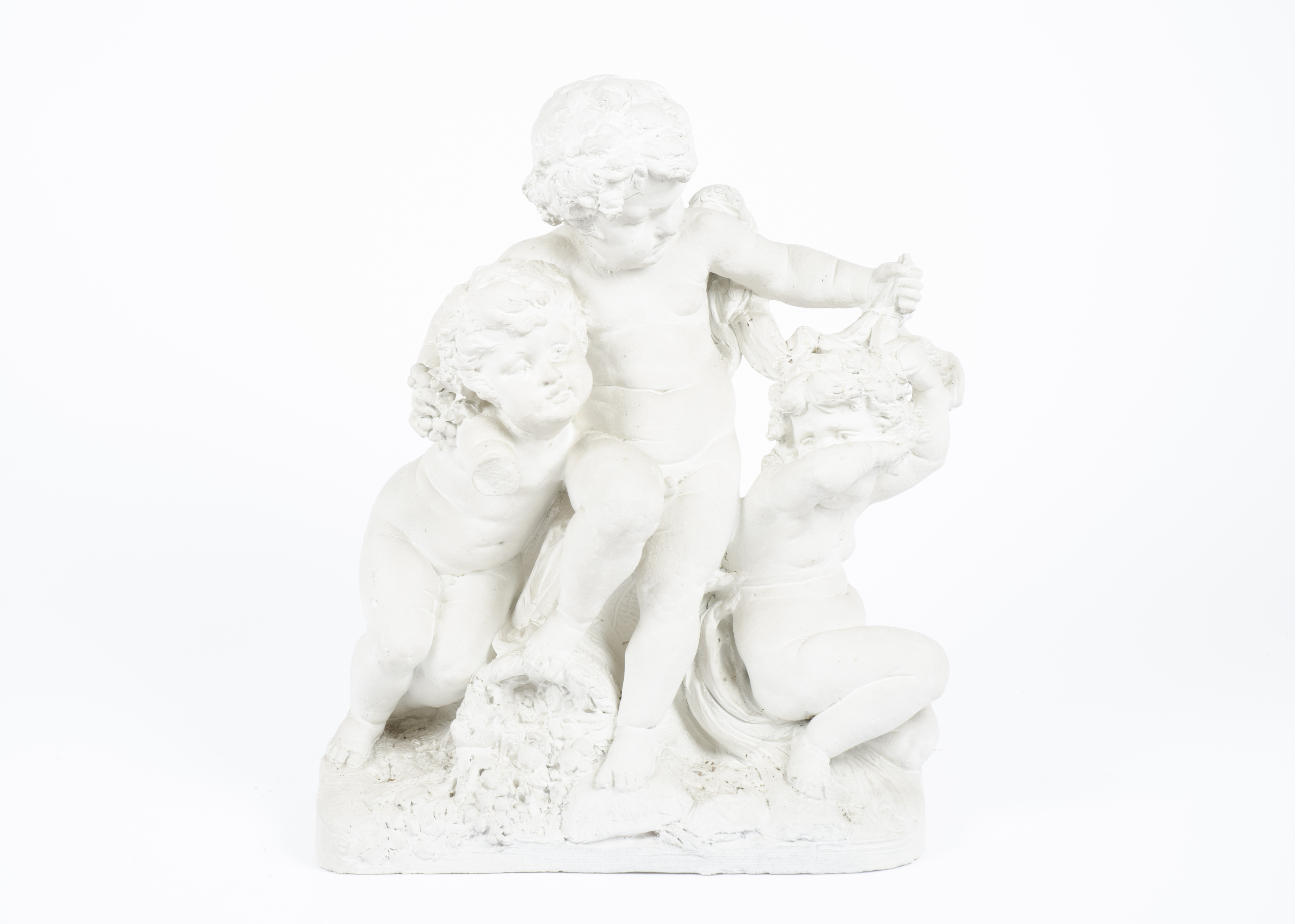 A plaster cast of three putti playing whilst overturning a basket of fruit, signed 'Lepere', af,