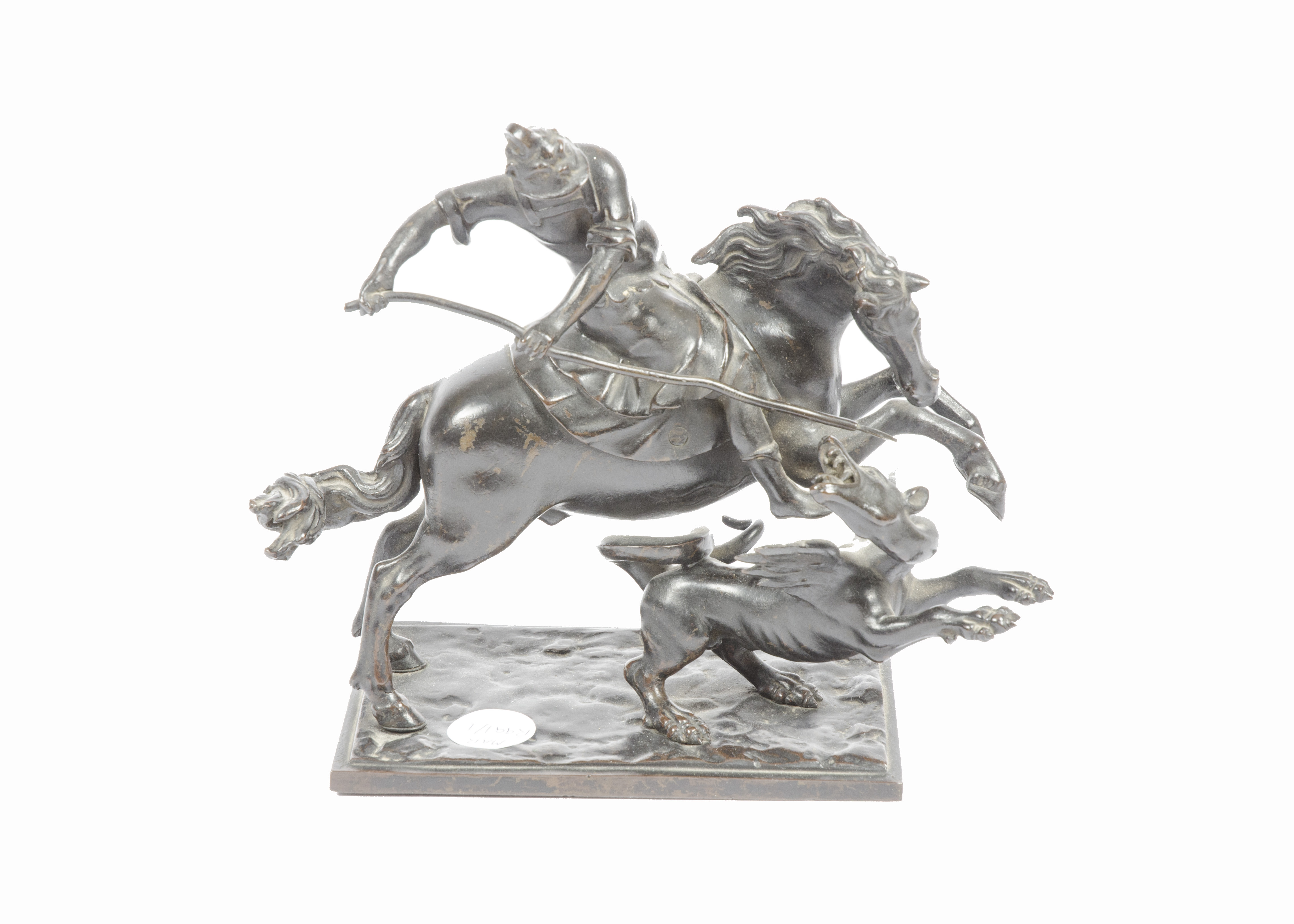 A bronze model of St George fighting the dragon, on horseback, dressed in armour and holding a