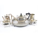 A selection of plated items, including candlesticks, teapots, trays, table salts and more, some in