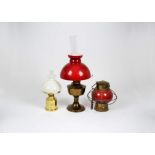 An E.S.S Sorensen Gilleleje Danmark 24923 oil table lamp, together with one other and three