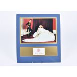 A wedding photo of Charles and Diana, Prince and Princess of Wales, mounted with signatures on a