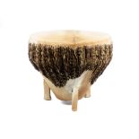 A large African hide drum, 56 cm diameter 50 cm high