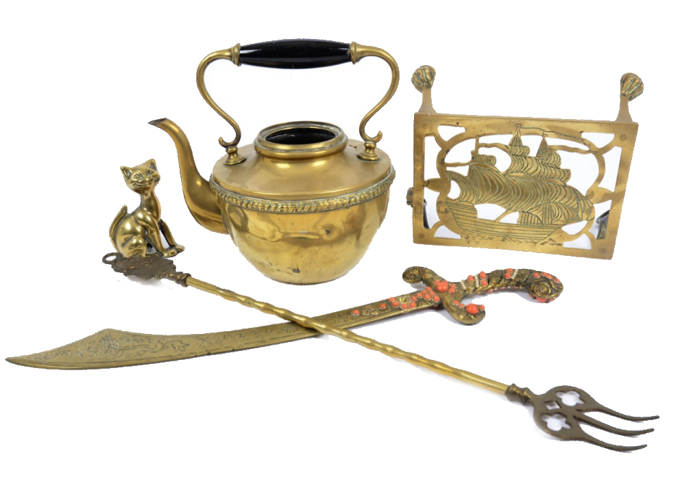 A selection of 20th Century brassware, including teapots, ornamental machete, a doorstop and more