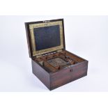 A Victorian rosewood and brass bound twin-handled writing box, hinged lid revealing tooled leather