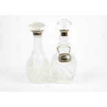 A modern silver mounted cut glass decanter by Israel Freeman and Son, ovoid body, knopped stem,