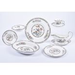 A Wedgwood part dinner service in the 'Kutani Crane' pattern, no.R4464, including six cups and