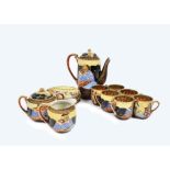 A 20th Century Japanese tea service, consisting of six cups and saucers, sugar bowl, milk jug and
