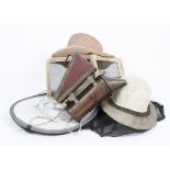 A selection of beekeeping equipment, consisting of three veils of assorted designs, together with