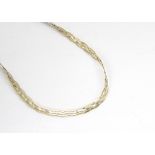 A contemporary 9ct gold bi colour plaited necklace, in white and yellow, 4g