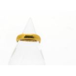 A modern 22ct gold wedding band, plain court shaped with hallmarks, 5.8g and size M