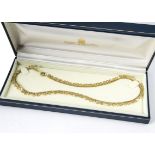 A 9ct gold contemporary fringe necklace, with bow and disc design in a Mappin & Webb box, 13g