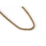 A 9ct gold fancy link necklace, each link with applied rope twist and punt wreath decoration with