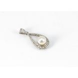 A white metal pearl and diamond drop pendant, of pear shape with central cultured pearl surrounded