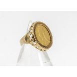 A Victorian half sovereign, 9ct gold mounted ring, the Jubilee head and ansell back on 9ct gold