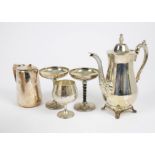 A large collection of silver plate, including goblets, bonbon dishes, teapots, cutlery and