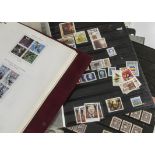A collection of Canadian stamps, in two albums and several loose pages, including Victorian and