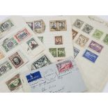 A small collection of Edwardian and later stamps, on loose pages and also packets of various world