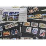 A collection of modern Royal Mail Mint Stamp Presentation Packs and other stamps, including approx