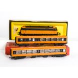 Early Hornby 00 Gauge Irish livery Locomotive and coaches, orange and black Hymek, in an original