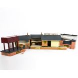 A Collection of Bassett-Lowke and Hugar Lineside Buildings, including four B-L signal boxes (