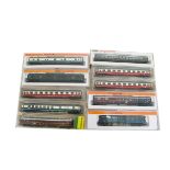 Arnold and Minitrix N Gauge Coaches, a cased gropu of fourteen coaches in various liveries