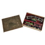 An Early Hornby 0 Gauge '2710' Clockwork Passenger Train Set, in original mock-leather set box,
