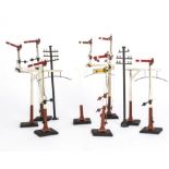 A Collection of Bassett-Lowke or similar Telegraph Poles and Signals, comprising 14 three-bar