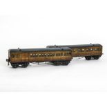 Two Hornby 0 Gauge Metropolitan Coaches, of the early HV design with lighting sockets to each end