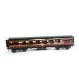 An Exley for Bassett-Lowke 0 Gauge K5 LMS Corridor 1st/3rd class Composite Coach, in LMS maroon,