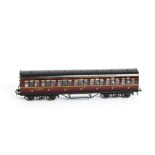 An Exley for Bassett-Lowke 0 Gauge K6 LMS Suburban 3rd Class Coach, in LMS maroon, with running no
