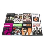 Various music DVDs, approximately eighty five DVDs with artists including Elvis, Blondie, Dionne