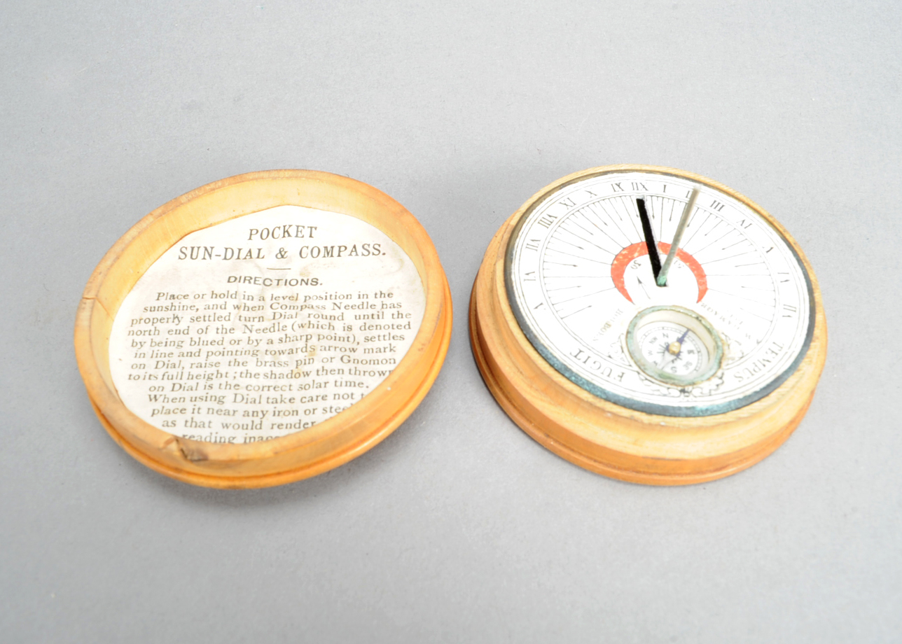 A late 19th Century boxwood Pocket Sun-Dial and Compass, retailed by A W Gamage Ltd, Holborn, with