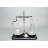 A 20th Century pair of chrome-plated Co-Op 2lb Shop Scales, stamped Co-Operative Wholesale