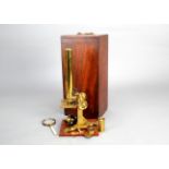 A mid-19th Century lacquered brass S Maw & Son Compound Monocular Microscope, with one objective and