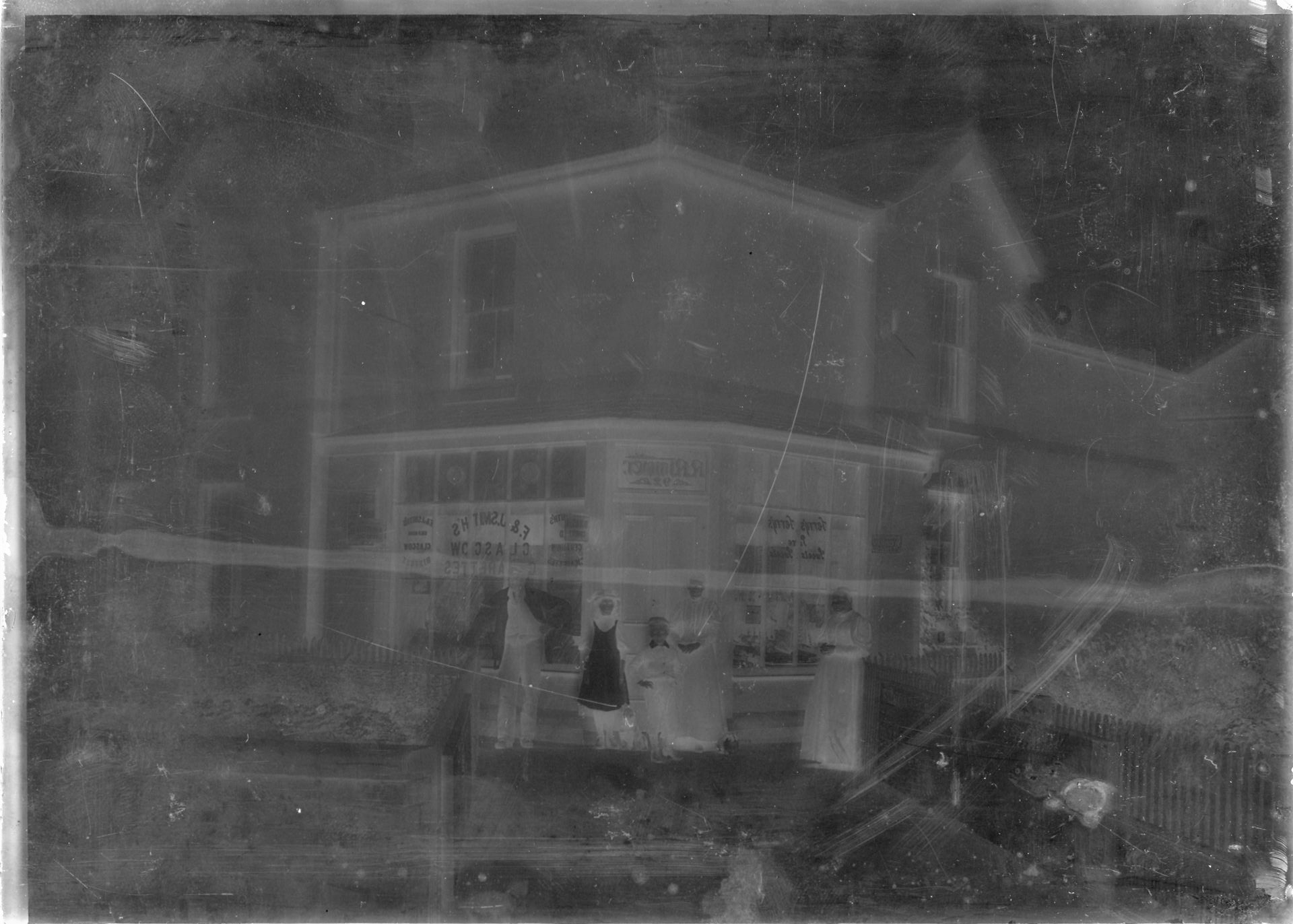 Glass half-plate Negatives, including corner shop in or near Southport, mainly family groups and