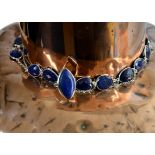 A lapis lazuli chain necklace, stamped 925, 106 cm long, together with a lapis lazuli ring,