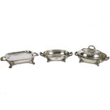 A group of four silver plated tureens and covers, two oval, two rectangular, one with handle in