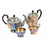 An early 20th Century four piece silver plated tea set, comprising teapot, coffee pot, milk jug