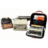 A 20th Century Imperial 'Good Companion' portable typewriter, in sea green finish, with original