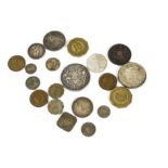 A collection of coins, including an 1889 crown, an 1835 East India Company Half Anna, other