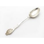 A modern silver presentation tablespoon from Theo Fennell, from Goodwood Racecourse and engraved