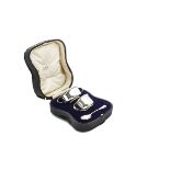 A cased George V silver three piece Christening set by Alexander Clark, the black fitted box