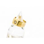 An 18ct gold gentleman's diamond set signet ring, the single old cut stone in gypsy setting,