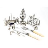 A group of 19th and 20th Century silver and silver plate, including two silver toast racks, one in