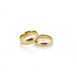 A gentleman's 9ct gold wedding band, ring size U, 8.5g together with another similar, ring size T,